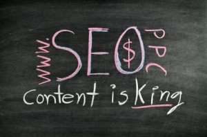 Marketing Heroes in College Station, TX - Image of Search Engine Optimization concept "Content is king" written on blackboard